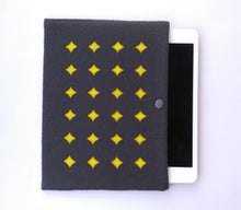 gray and yellow ipad sleeve